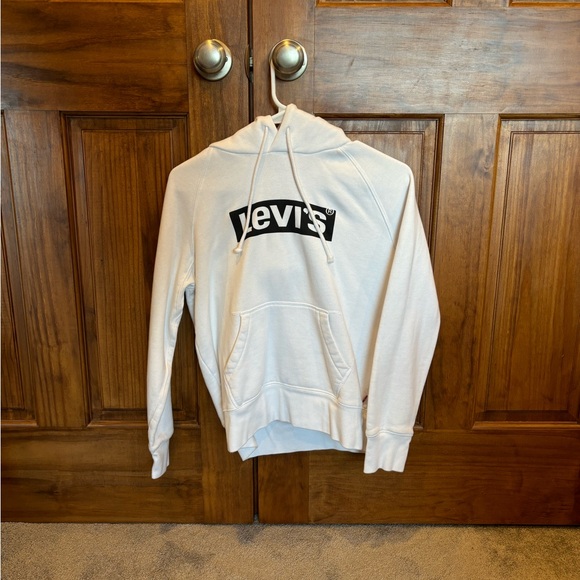 Levi's Tops - XS Levi hoodie. Pink stain on the back as shown on last picture.